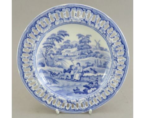 An early nineteenth century blue and white transfer-printed bone china Spode Shepherdess pattern arcaded plate, c. 1825. It i