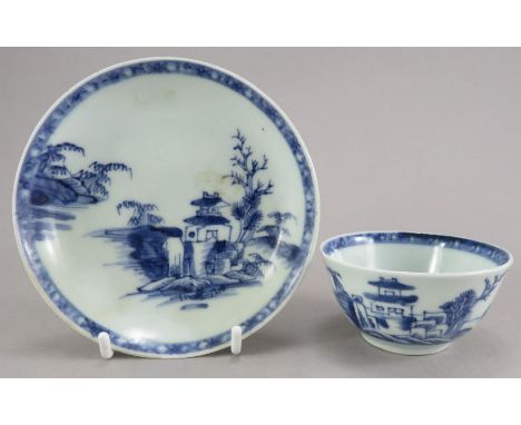 An eighteenth century blue and white hand-painted Chinese Nanking Cargo tea bowl, c. 1750. It bears the Christie's label to t