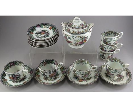 An early nineteenth century transfer-printed and coloured part tea service, c. 1830-40. Each piece is decorated with flowers 