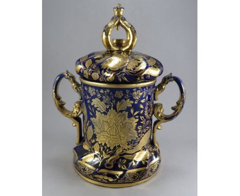 An early nineteenth century Masons ironstone large and impressive two-handled covered pot on splayed foot with coronet finial