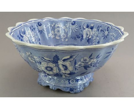 An early nineteenth century blue and white transfer-printed Spode Botanical series large footed bowl, c. 1828. It is printed 