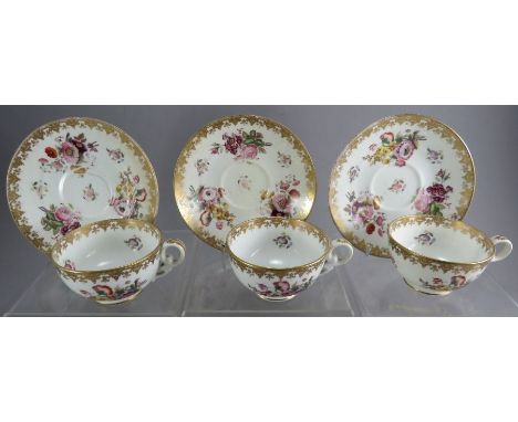 A group of three early nineteenth century Copeland and Garrett cups and saucers , c. 1825. All hand-painted with flowers and 