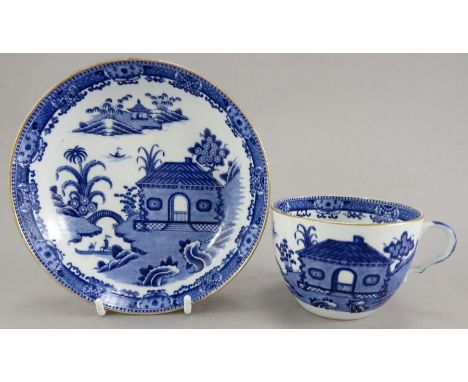 An early nineteenth century blue and white transfer-printed Spode Bungalow pattern cup and saucer, c. 1815. It is unmarked to