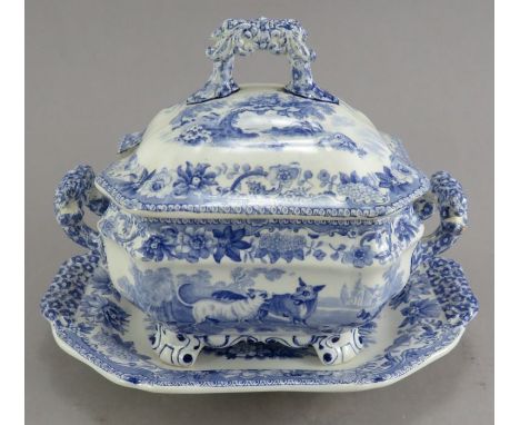 An early nineteenth century blue and white transfer-printed Spode Aesop's Fables series sauce tureen, cover and stand, c. 182