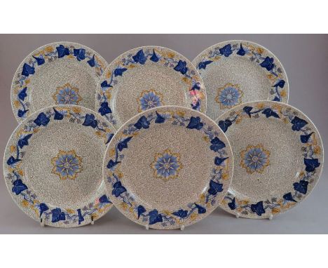 A set of six early nineteenth century Spode green and white transfer-printed dessert plates with blue and yellow highlights, 