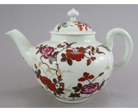 A rare eighteenth century Worcester hand-painted globular teapot and cover, c. 1756. It is decorated with flowers, blossom an