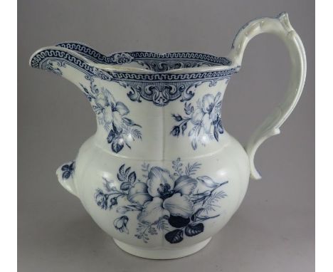 A mid-nineteenth century blue and white transfer-printed Davenport footbath jug, c. 1840. It is decorated with the Lilium pat