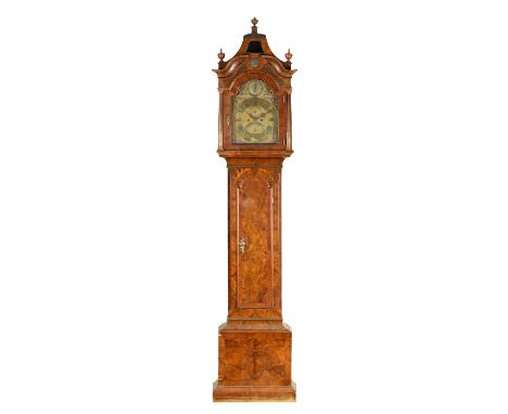 HEIDERICH IN HAMBURG. AN EARLY 18TH CENTURY BURR WALNUT EIGHT-DAY LONGCASE CLOCK the 12" arched brass dial with Rococo brass 