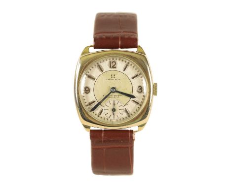 A 1930s GENTLEMAN’S 9 CARAT GOLD OMEGA WRISTWATCH on later crocodile leather strap, the gold cushion shaped case enclosing a 