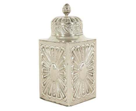 A VICTORIAN SQUARE SILVER TEA CADDY AND COVER with embossed panelled sides and matching embossed lid with pineapple finial Lo