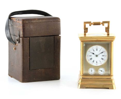 A LARGE AND UNUSUAL 19TH CENTURY FRENCH CARRIAGE CLOCK WITH TWO ALARM DIALS the moulded brass case with bevelled glass panels