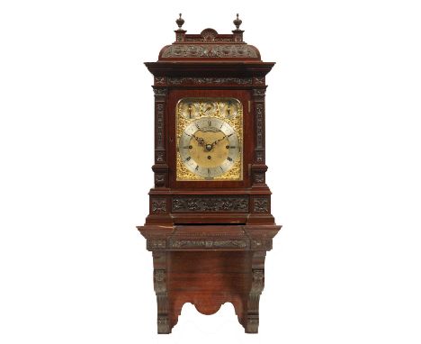 A LATE 19TH CENTURY TRIPLE FUSEE BRACKET CLOCK WITH HANGING BRACKET the carved mahogany case enclosing a 7" brass dial with g