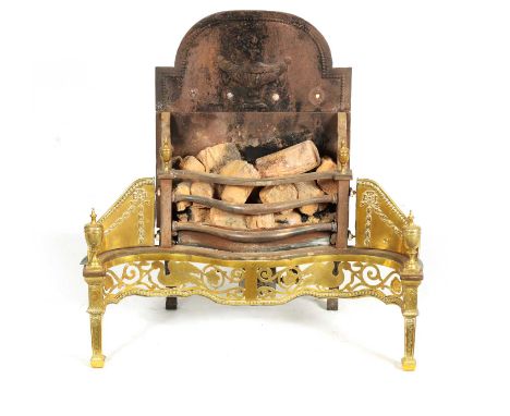 A GEORGE III SERPENTINE FRONTED FIRE GRATE with Adam style with engraved pierced front standing on tapering legs with urn fin