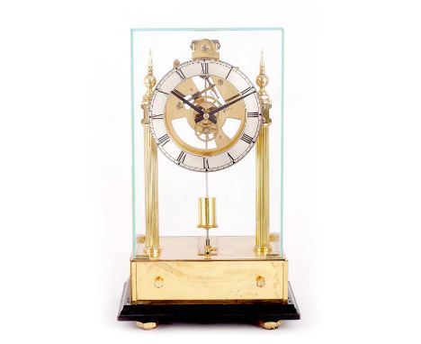 A 20TH CENTURY BRASS ELECTRIC MANTEL CLOCK UNDER GLASS CABINET the movement run by an electric magnetic pulse swinging the pe