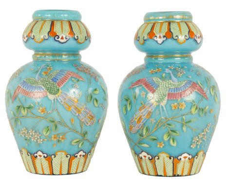 A PAIR OF 19TH CENTURY FRENCH BLUE OPAQUE GLASS VASES the bulbous bodies beneath swollen necks decorated in coloured enamels 