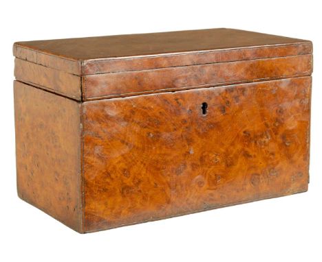 A GEORGE III BURR ELM TEA CADDY of rectangular form with hinged lid and original lock - Lacking key21cm wide, 12cm deep, 13cm