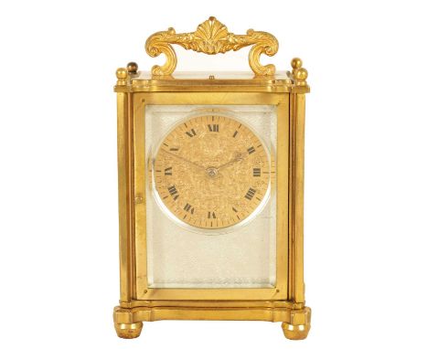 M.J. BORERELL. A 19TH CENTURY ENGLISH GILT BRASS CARRIAGE CLOCK the case with fixed rococo style handle above a rectangular c