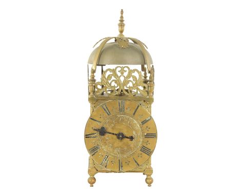 AN EARLY 18TH CENTURY BRASS SINGLE-HANDED VERGE LANTERN CLOCK - UNSIGNED with floral engraved centre surrounded by a Roman ch