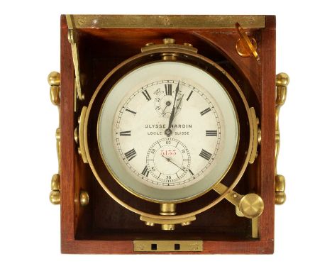 ULYSSE NARDIN. A GERMAN BRASS CASED THIRD REICH MARINE CHRONOMETER ENGRAVED WITH SWASTIKA the brass gimballed case enclosing 