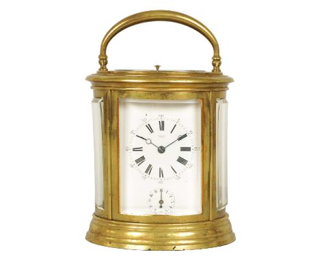 DROCOURT.  A 19TH CENTURY FRENCH OVAL CASED GRAND SONNERIE REPEATING CARRIAGE CLOCK the moulded brass case with bevelled glas