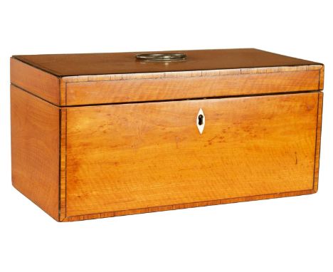 A REGENCY SATINWOOD AND KINGWOOD CROSS BANDED TEA CADDY of rectangular form with ebony strung edge and hinged lid opening to 