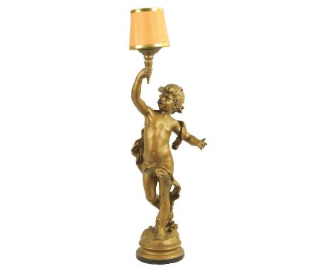 AN EARLY 20TH CENTURY GILT METAL LAMP AFTER AUGUSTE MOREAU depicting a Putto on an ebonised base83cm high overall 