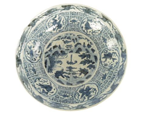 A MING DYNASTY BLUE AND WHITE CHINESE LARGE DISH decorated with panels of animals and fish within geometric borders enclosing