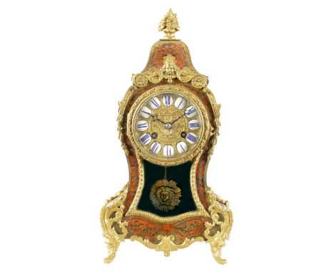 A LATE 19TH CENTURY FRENCH BOULLE WORK BRASS AND TORTOISESHELL INLAID MANTLE CLOCK the waisted case with floral finial and or