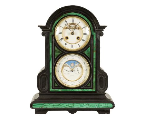 A LATE 19TH CENTURY MALACHITE AND BLACK SLATE FRENCH MANTEL CLOCK the arched case with scrolled sides and inset malachite pan