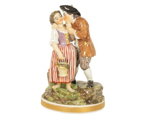 AN EARLY19TH CENTURY NIDERVILLER PORCELAIN FIGURE GROUP OF LARGE SIZE well modelled and coloured as young lovers standing on 