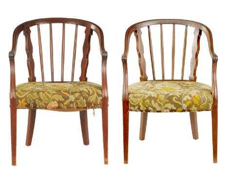 A PAIR OF GEORGE III MAHOGANY OPEN TUB CHAIRS with spindle backs and C scrolled carved corners, scrolled moulded arms and uph