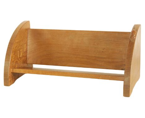 A ROBERT 'MOUSEMAN' THOMPSON OAK BOOK TROUGH with curved ends and carved mouse trademark46cm wide