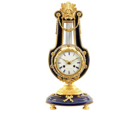 PERRIN, A PARIS. A FRENCH 19TH CENTURY ENAMEL AND ORMOLU LYRE SHAPED MANTEL CLOCK the blue porcelain case surmounted by a fem