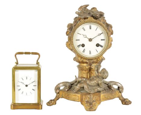 TWO 19TH CENTURY FRENCH CLOCKS the carriage clock with a one-piece brass case, bevelled glass panels and enamel dial fronting