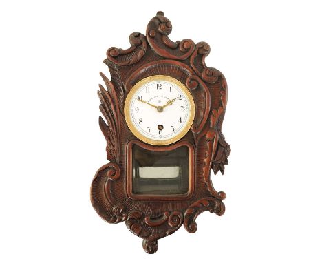 CLAUDE GRIVOLAS, PARIS. AN EARLY 20TH CENTURY PENDULE 400 JOURS TORSION WALL CLOCK the carved hardwood case of scroll and lea