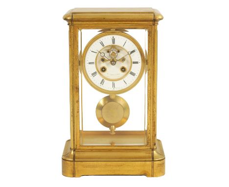 A 19TH CENTURY FRENCH EIGHT-DAY FOUR GLASS MANTEL CLOCK the visible escapement surrounded by an enamel dial with Roman numera