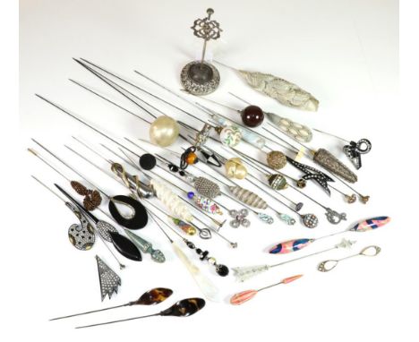 Assorted Early 20th Century and Later Hat Pins, including a silver mounted hat pin stand on an embossed circular weighted bas