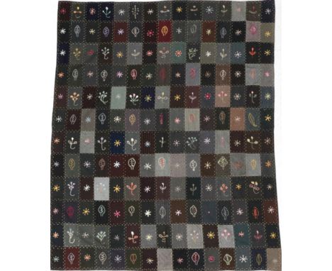 Early 20th Century Suiting Patchwork Embroidered with Motifs, comprising rectangular patches of wool suiting in a variety of 