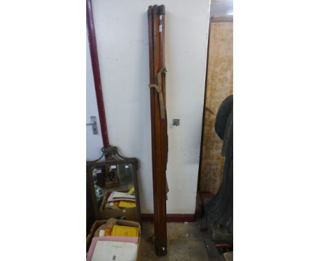 A vintage mahogany surveyor's measuring stick 