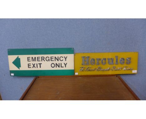 A vintage Hercules bicycle sign and a metal Emergency Exit sign 