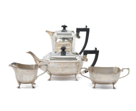 GEORGE V SILVER FOUR PIECE TEA SET J. Gloster Ltd, Birmingham 1921, of rectangular form, scroll engraved, ebonized handles an