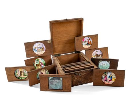 BOXED VICTORIAN MAGIC LANTERN SLIDES, coloured circular glass slides in mahognay frames, comprising part set of 5/6 Grace Dar