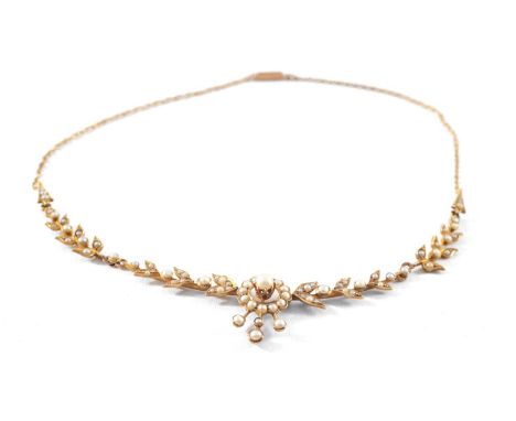 15CT GOLD SEED PEARL NECKLACE, of flower head and foliate design, 34cms long, 8.7gmsProvenance: private collection Pembrokesh