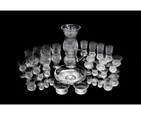 LARGE SUITE OF EDINBURGH CRYSTAL ENGRAVED TABLE GLASS, including tall beakers, champagne flutes, tealight holders, water jug,