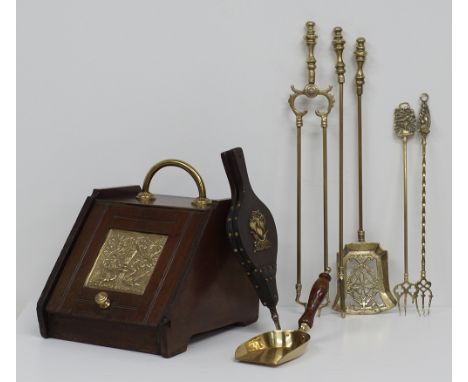 Fireplace accessories and tools, comprising a coal box with handle and small shovel that rests neatly within the rear-mounted
