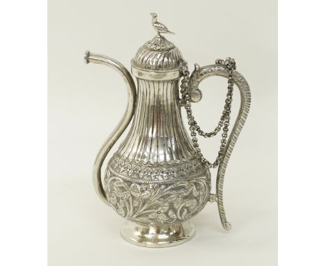 A North Indian Mughal style silver Chuski - Opium water flask - with a bird finial on the lid, linked to the handle with a do