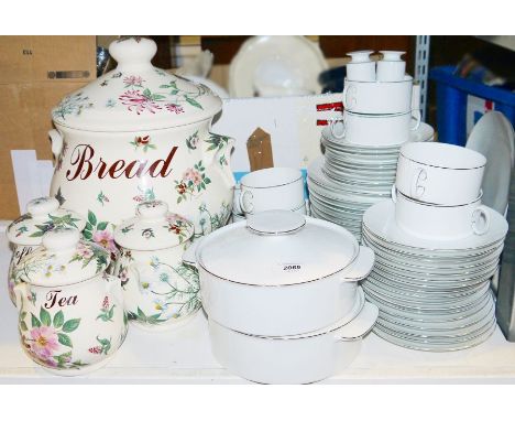 Thomas (Rosenthal) part dinner service, white glazed with silver banding, a large pottery lidded bread bin&nbsp;with floral d