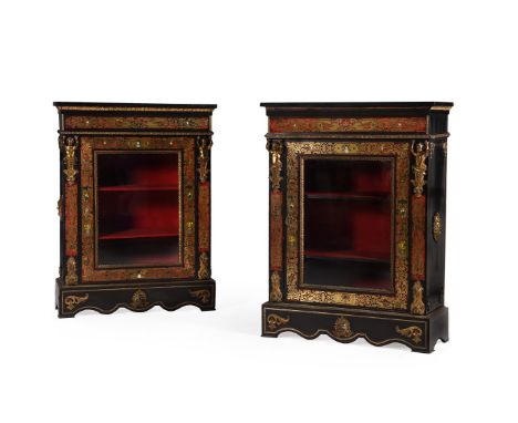 Y A PAIR OF NAPOLEON III GILT METAL MOUNTED, EBONISED, TORTOISESHELL AND BRASS MARQUETRY PIER CABINETSIN THE MANNER OF ANDRE 