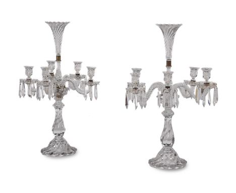 A PAIR OF BACCARAT FIVE LIGHT GLASS CANDELABRA 20TH CENTURY With central trumpet vase above five twist moulded glass s-scroll