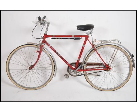 A vintage 1970's gentlemans ' Elite ' retro bicycle in red. Original decals, saddle and handlebars in place ( see illustratio